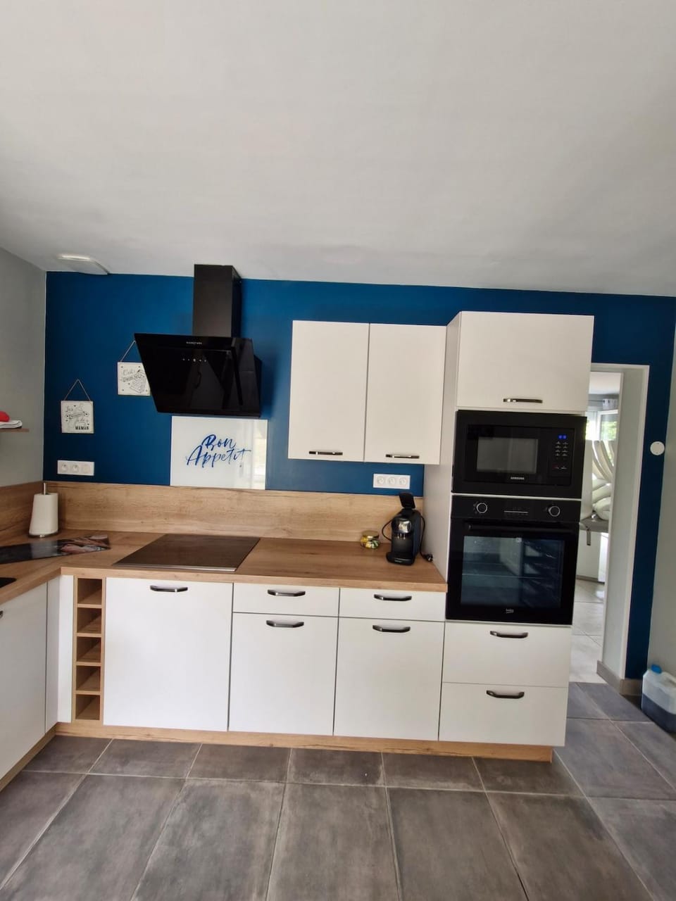 Kitchen or kitchenette, dishwasher, oven, stove