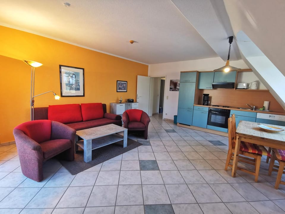 Kitchen or kitchenette, Living room, Seating area, Dining area