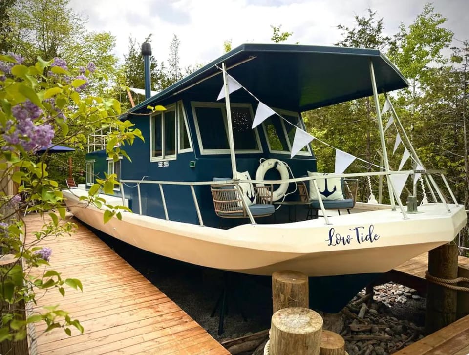 Lake Escape in Cozy Boathouse Surrounded by Forest Docked boat in Greater Napanee