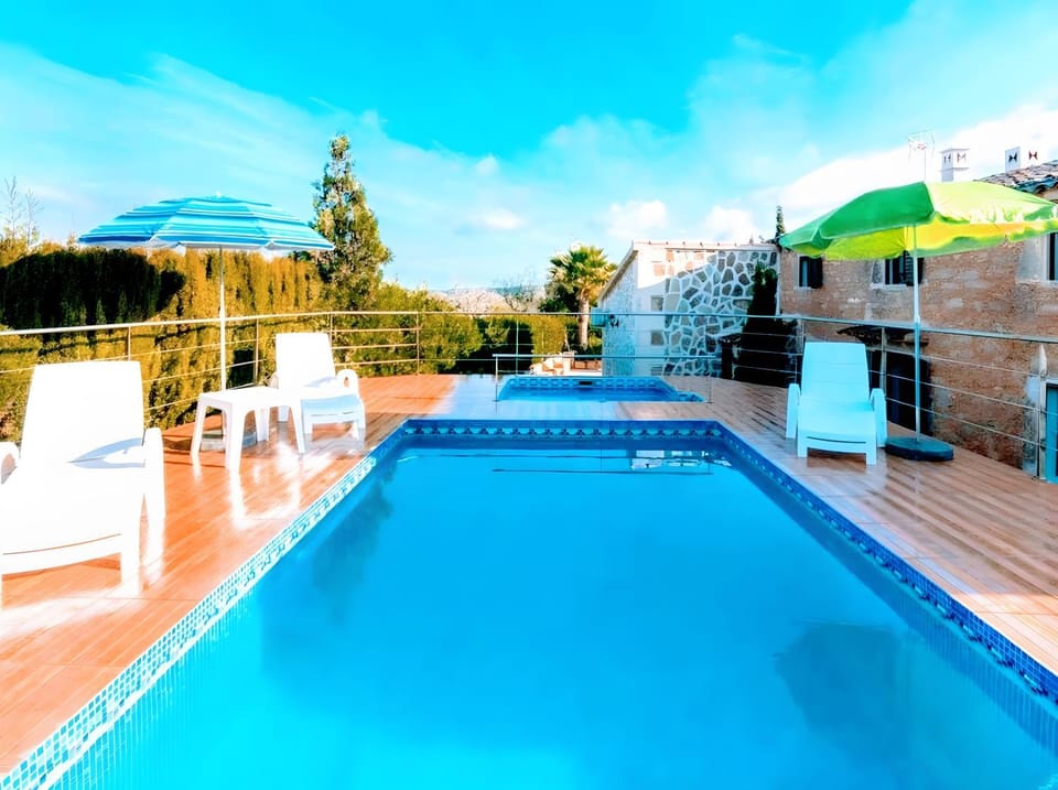 Property building, Living room, Swimming pool