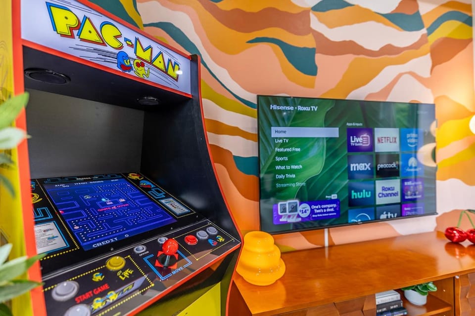 Movie Theater Rooftop King Bed Arcade BBQ House in Seattle