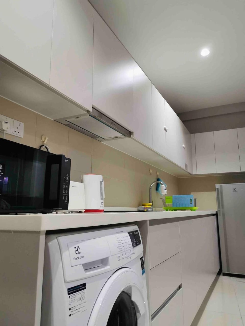 Kitchen or kitchenette, oven, stove, washing machine