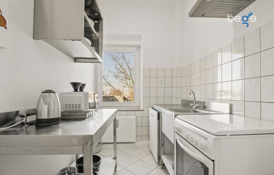 Kitchen or kitchenette, dishwasher, oven, stove, toaster