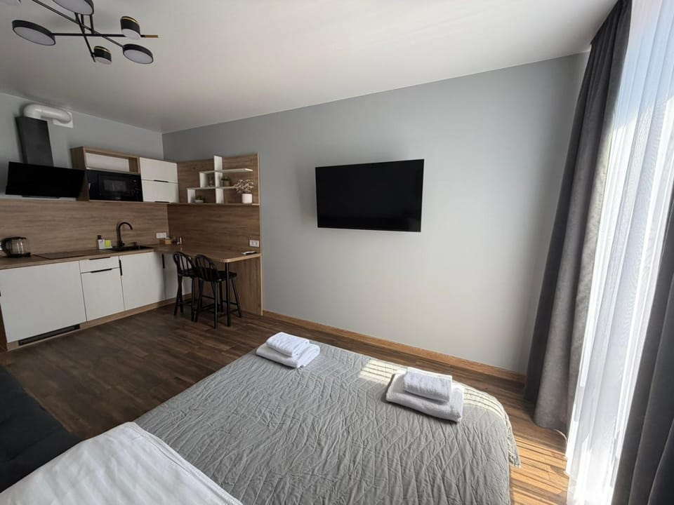 Bed, TV and multimedia, Kitchen or kitchenette, Bedroom, towels