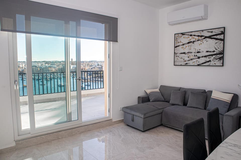 View (from property/room), Living room, Seating area, air conditioner