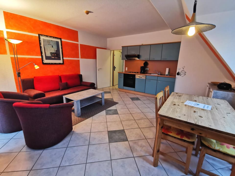 Kitchen or kitchenette, Living room, Seating area, Dining area