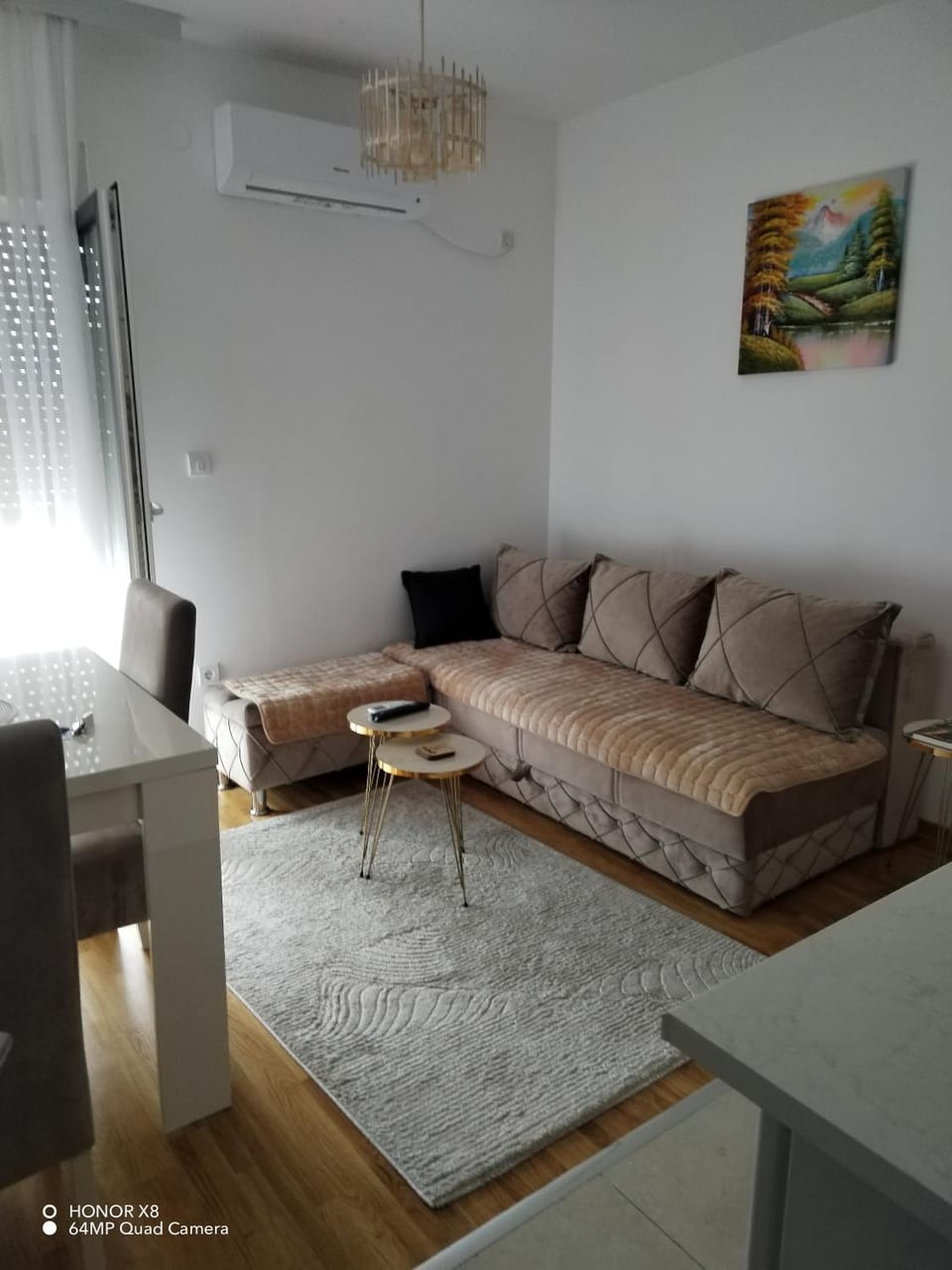 Property building, Living room, Seating area, air conditioner