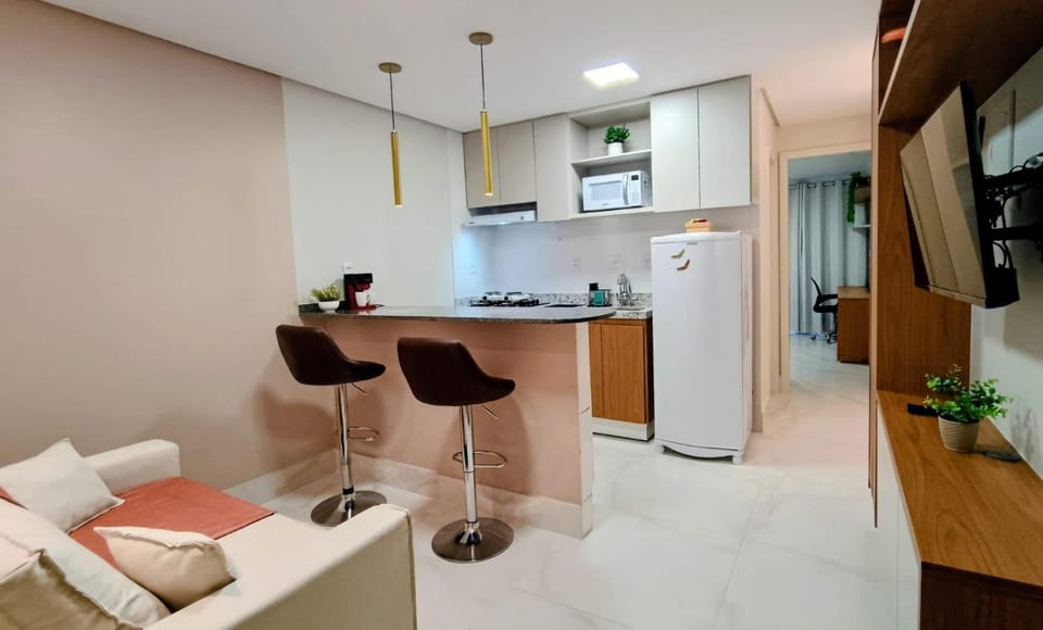 TV and multimedia, Kitchen or kitchenette, Living room, Seating area, Dining area, microwave, stove