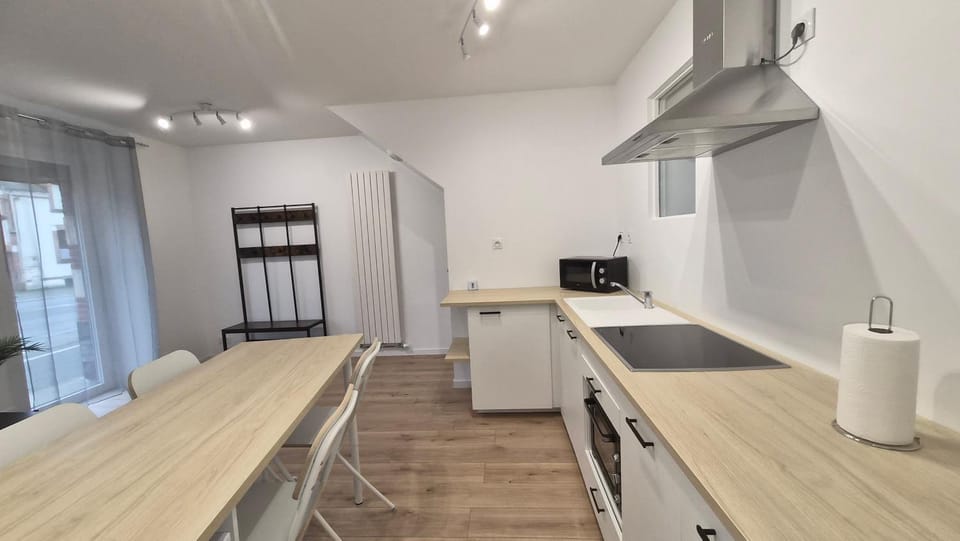 Dining area, dishwasher, oven, stove, kitchen