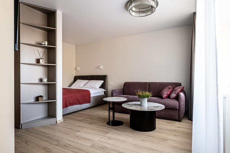 Bed, Living room, Seating area, Bedroom