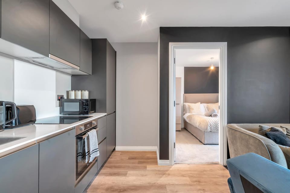 Kitchen or kitchenette, Living room, Bedroom, oven, stove, toaster
