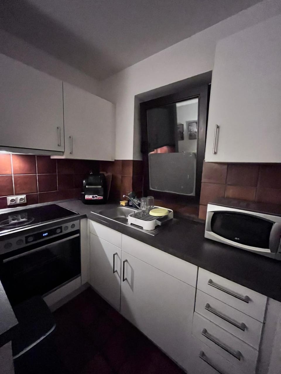 Kitchen or kitchenette, oven, stove, toaster