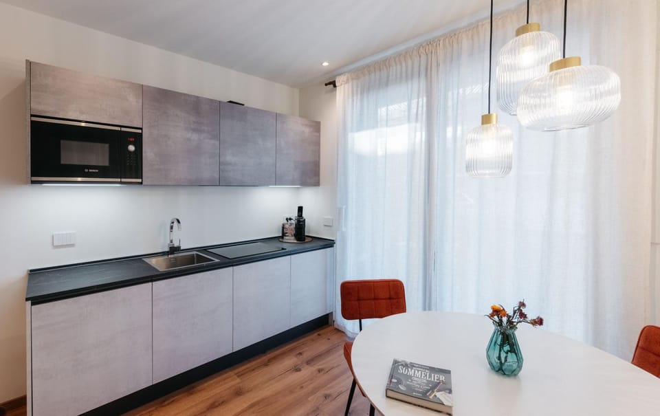 Kitchen or kitchenette, microwave, stove