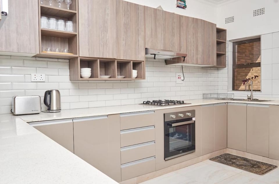 Kitchen or kitchenette, stove, toaster