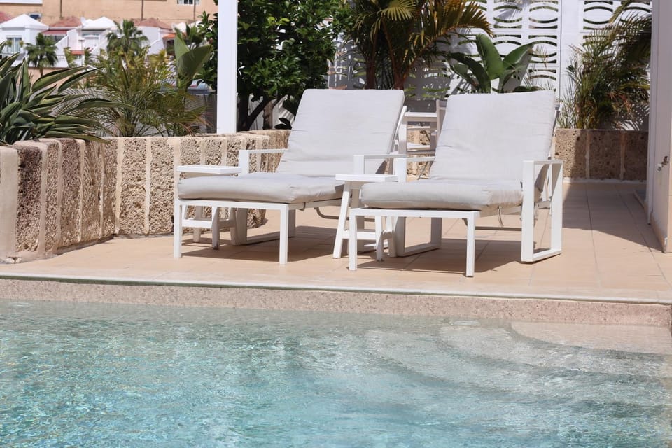 Swimming pool, sunbed