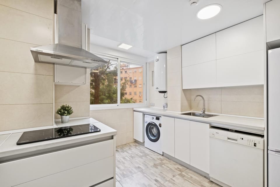 Kitchen or kitchenette, dishwasher, stove, washing machine