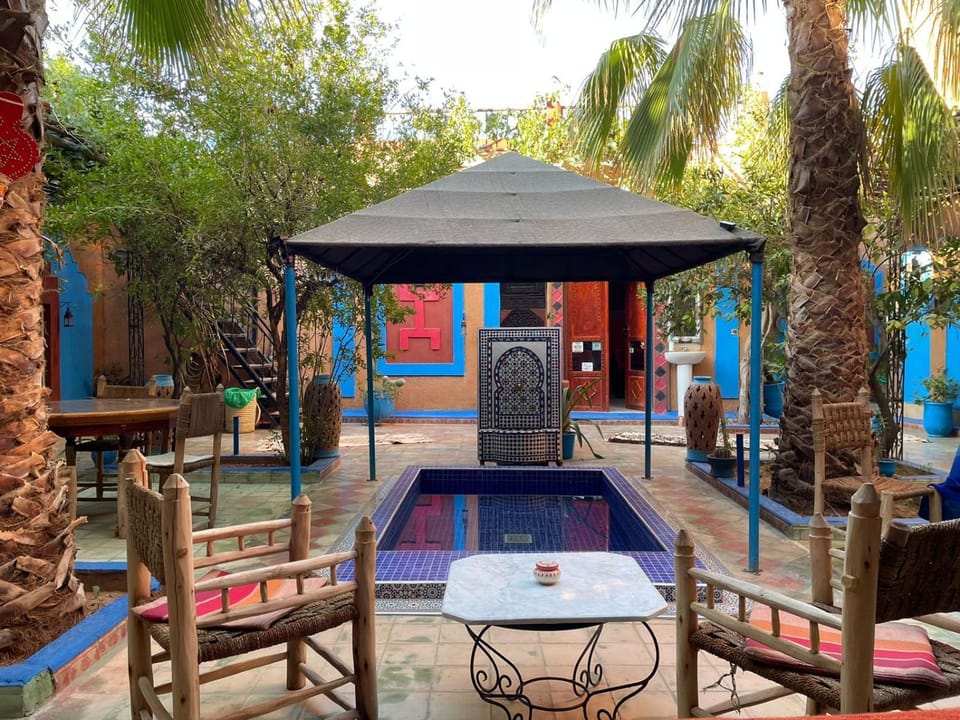 Property building, Patio, Restaurant/places to eat, Swimming pool