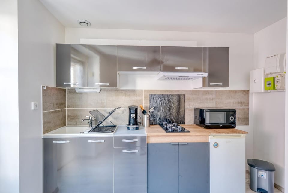 Kitchen or kitchenette, stove