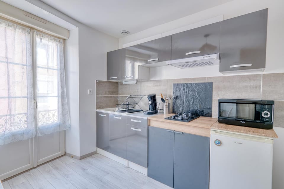 Kitchen or kitchenette, stove