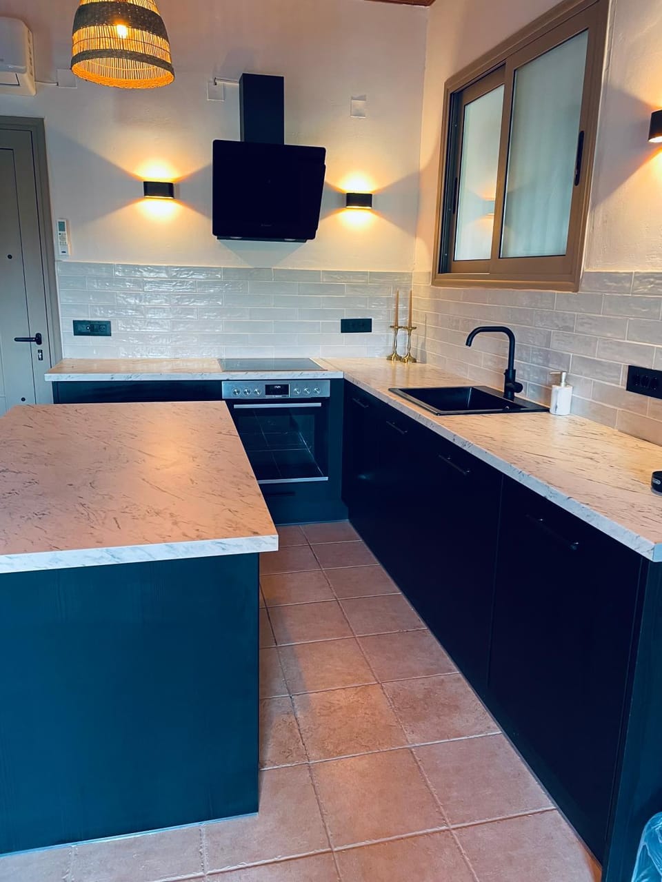 Kitchen or kitchenette, dishwasher, oven, stove