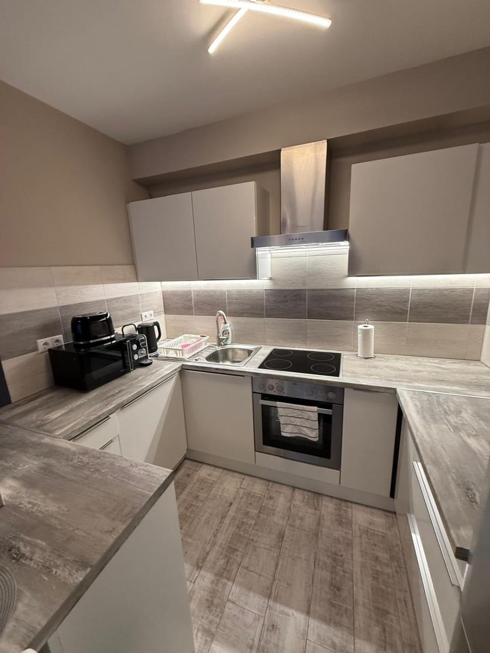 dishwasher, microwave, minibar, oven, stove, toaster