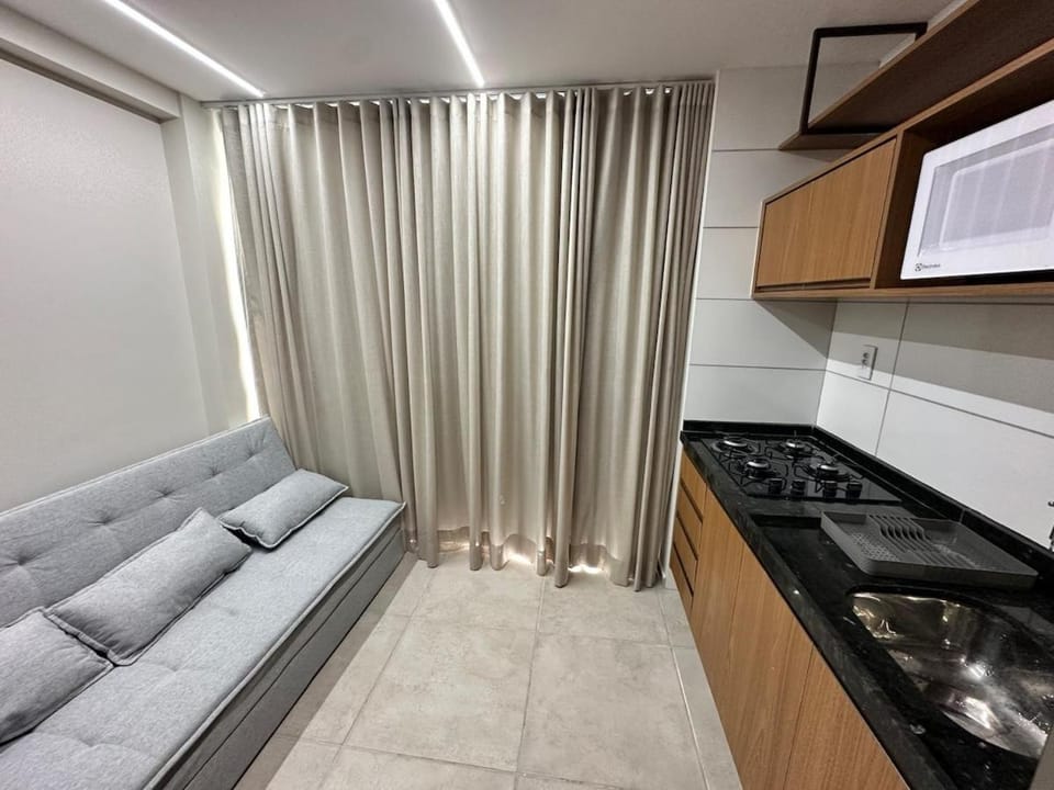 Kitchen or kitchenette, Living room, Seating area, stove