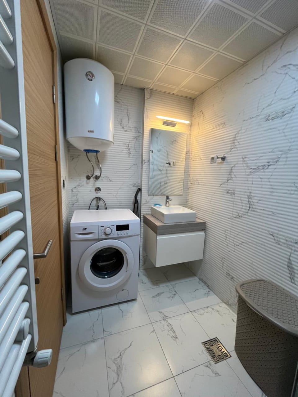 Shower, Toilet, Bathroom, towels, washing machine, dryer