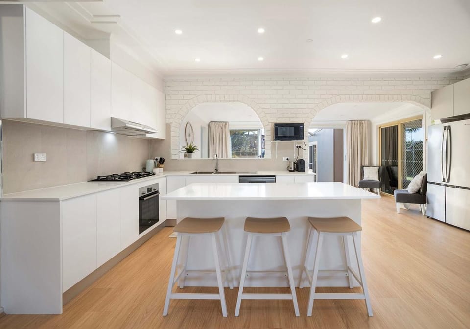 Kitchen or kitchenette, dishwasher, oven, stove, toaster