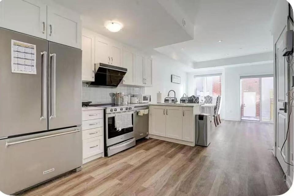 Kitchen or kitchenette, dishwasher, oven, stove, toaster