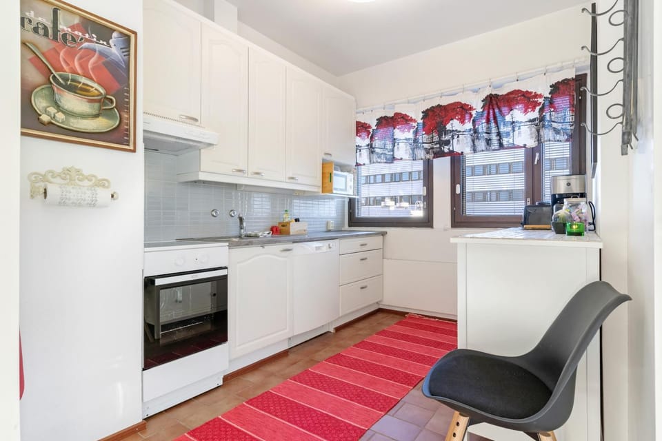 Kitchen or kitchenette, dishwasher, oven, stove