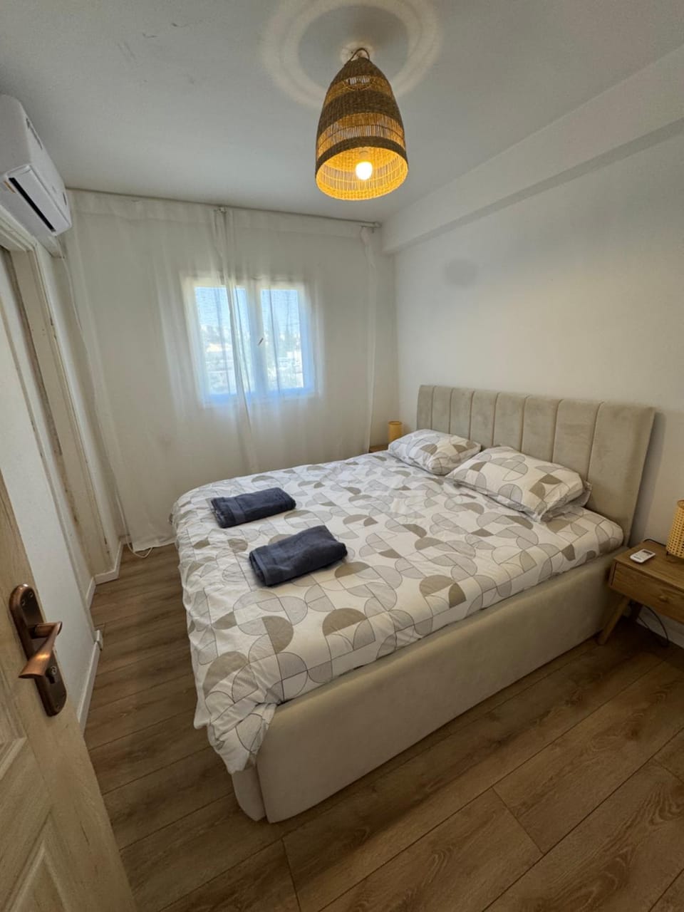 Bed, Photo of the whole room, Bedroom, towels, air conditioner