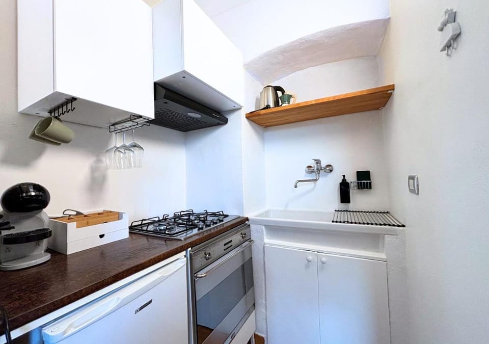 Kitchen or kitchenette, stove