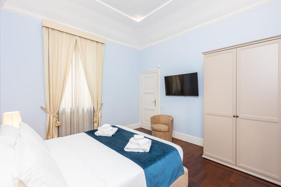Bed, TV and multimedia, Bedroom, towels, wardrobe