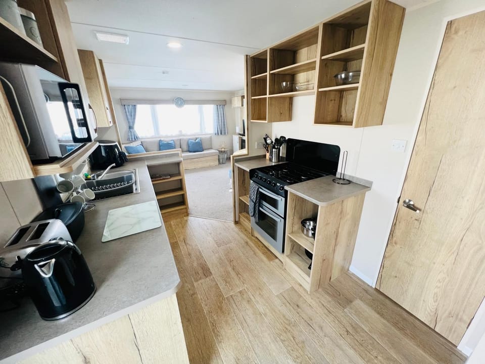 Kitchen or kitchenette, oven, stove, toaster