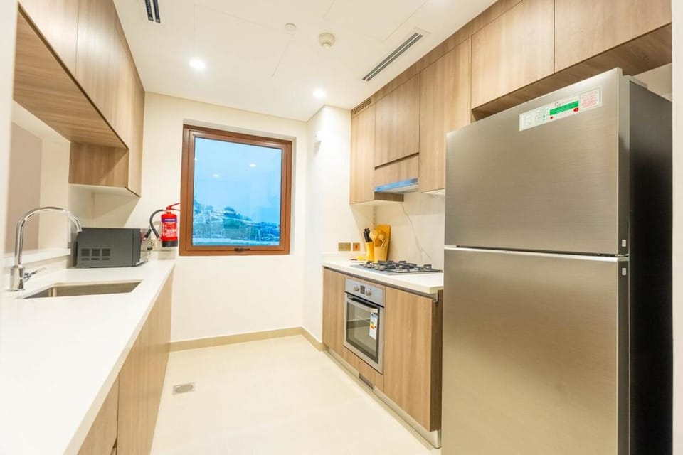 Yas Golf Collection 1 BR Near Theme Parks Apartment in Abu Dhabi