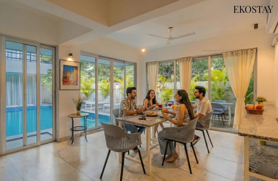 People, Living room, Seating area, Dining area, Swimming pool, group of guests