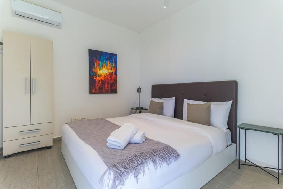 Bed, Bedroom, towels, wardrobe, air conditioner