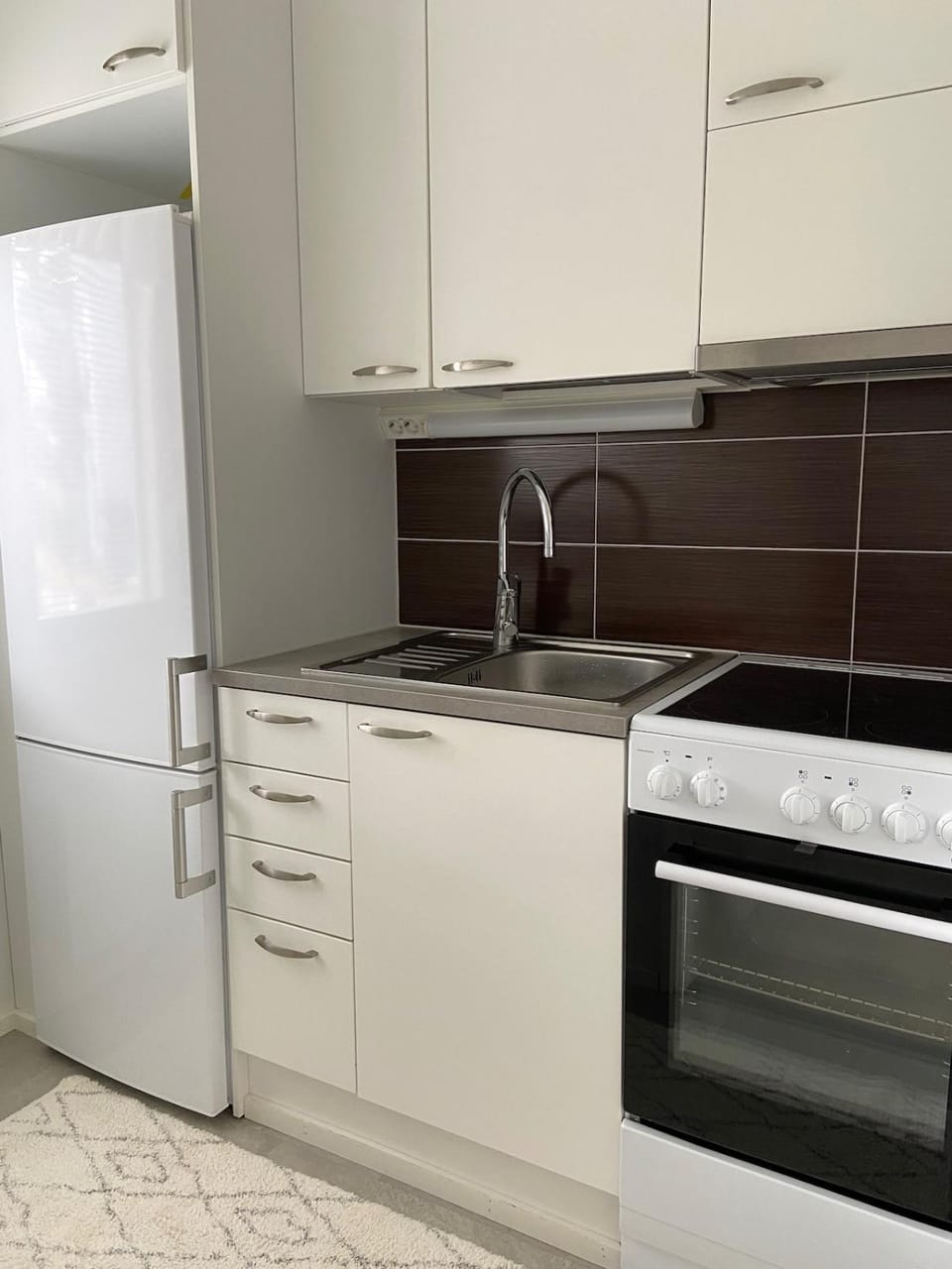 Kitchen or kitchenette, stove