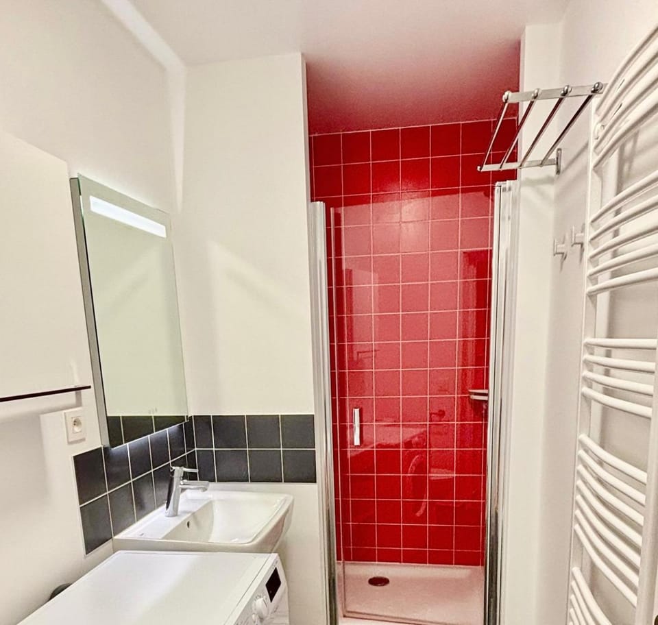 Shower, Toilet, Bathroom, hair dryier, towels, washing machine, dryer