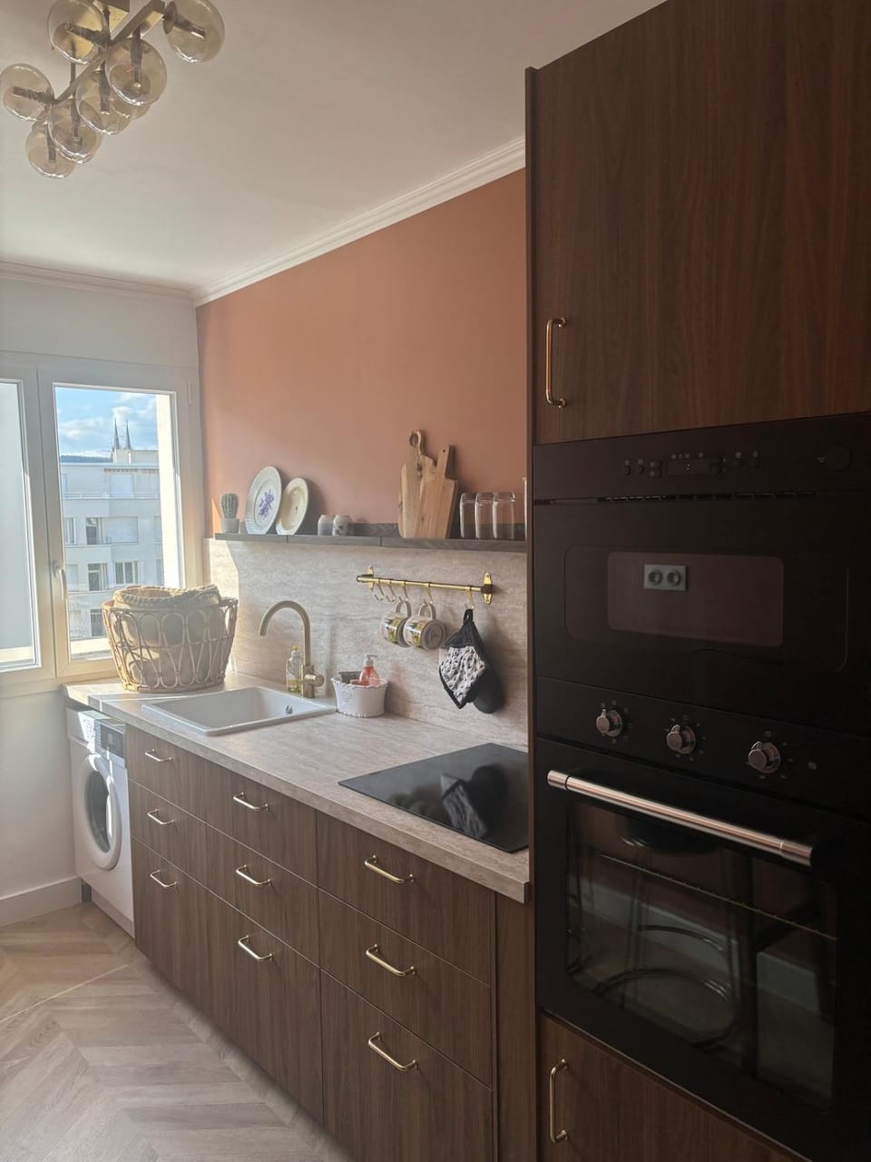 Kitchen or kitchenette, dishwasher, microwave, oven, stove, washing machine