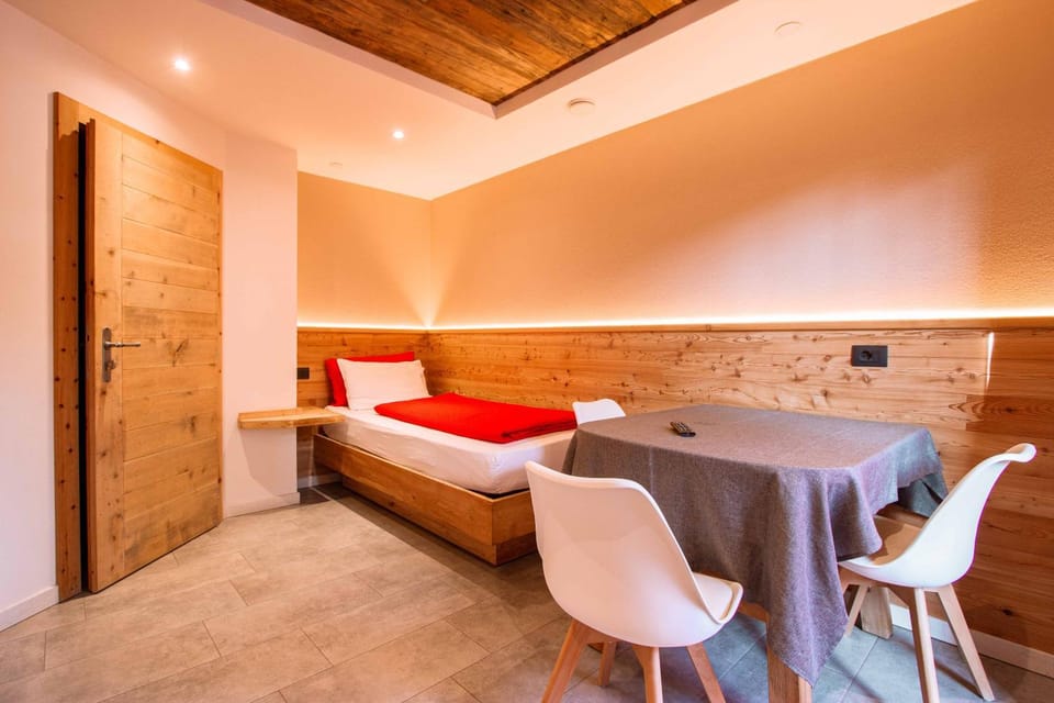 Bed, Living room, Seating area
