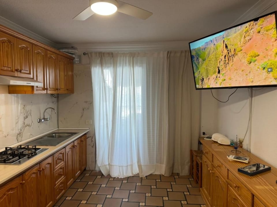 Kitchen or kitchenette, stove, kitchen