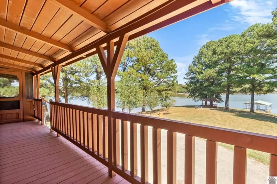 Lakefront Retreat with Fire Pit & Private Boat Dock, no steps to water! 3BR, 2BA House in Lake Barkley