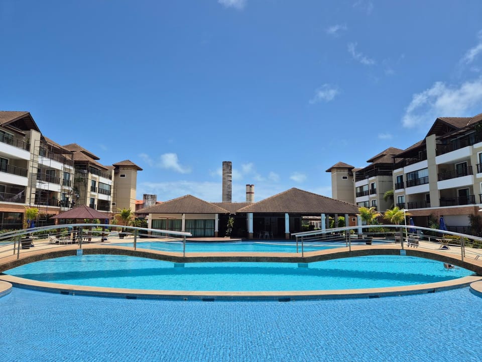 Property building, Day, Pool view, Swimming pool, Swimming pool, sunbed
