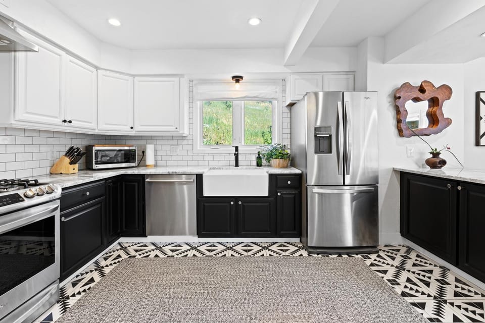 Kitchen or kitchenette, dishwasher, oven, stove, toaster