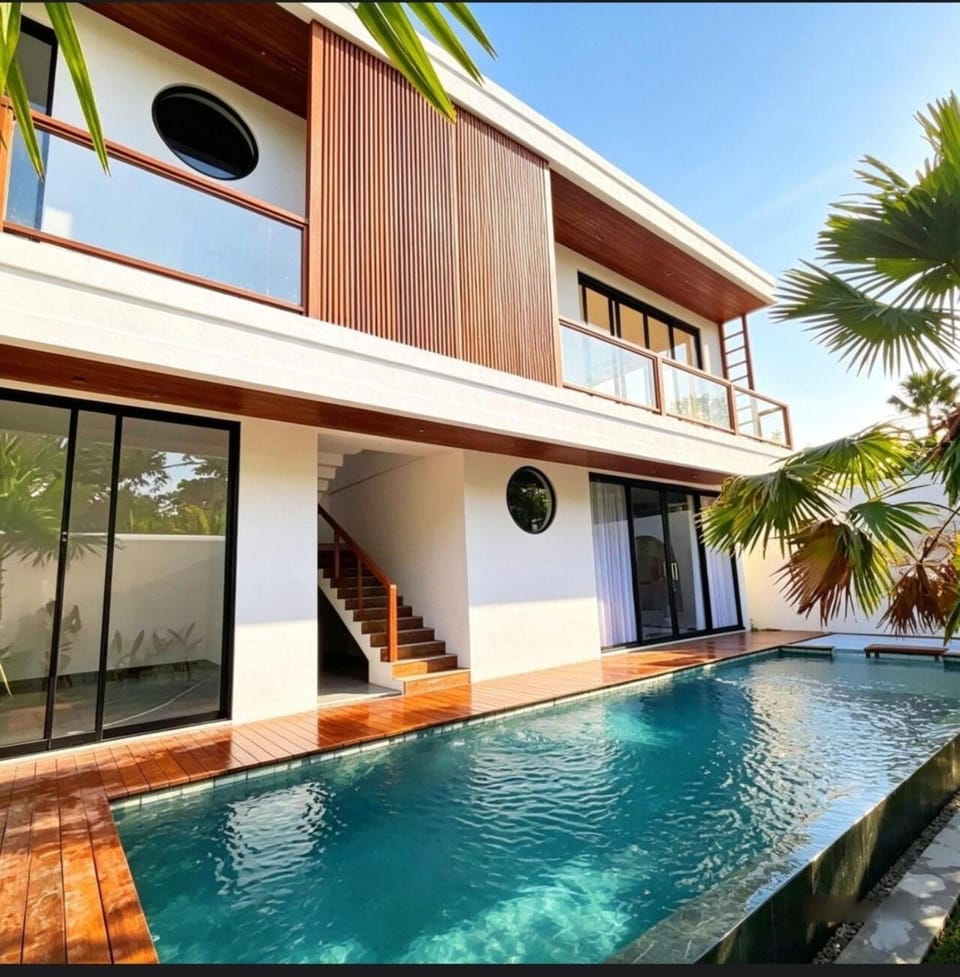 Property building, Patio, Day, Pool view, Swimming pool