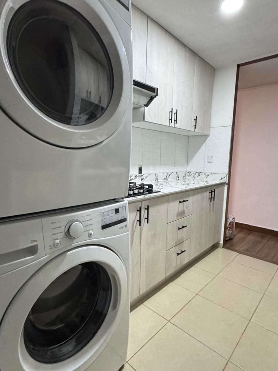 Kitchen or kitchenette, dishwasher, washing machine, dryer