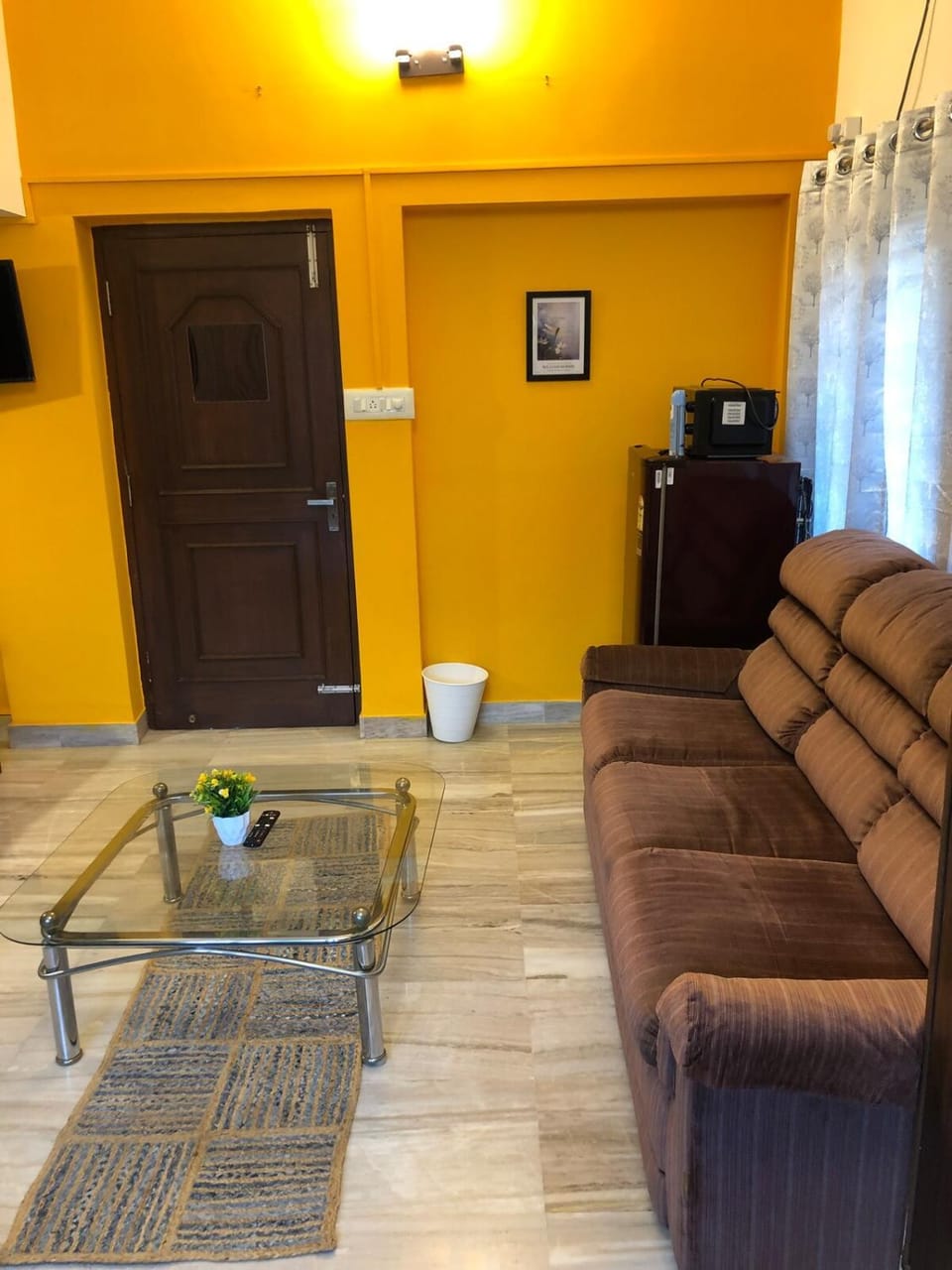 Cozy room at The Hole In The Wall Cafe Indiranagar Apartment in Bengaluru