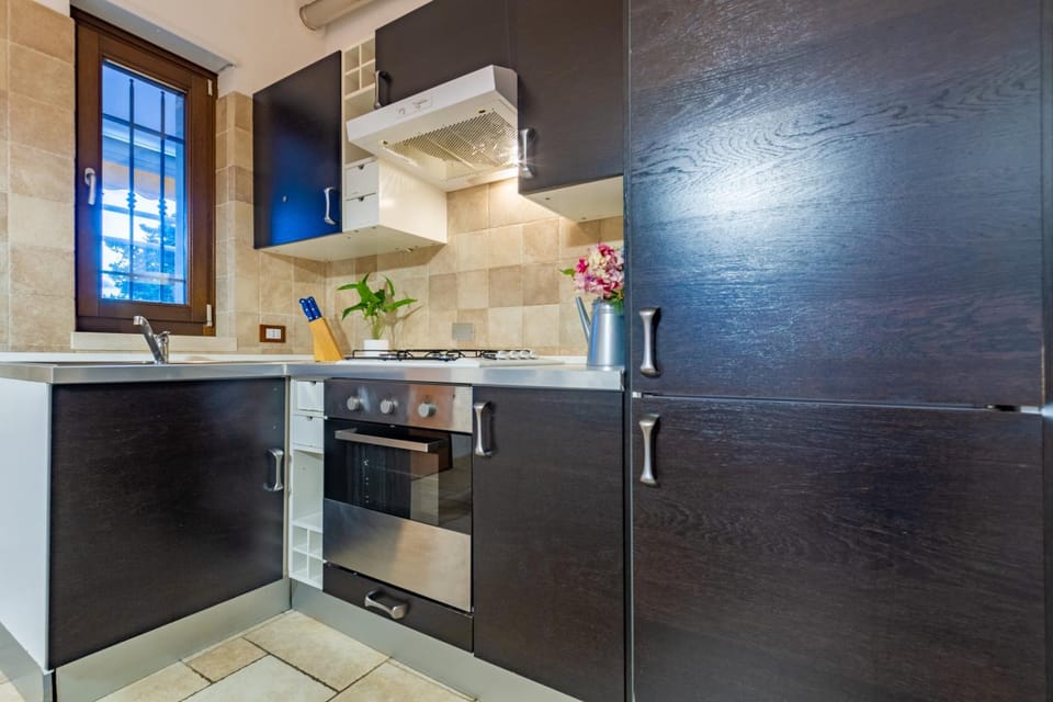 Kitchen or kitchenette, oven, stove