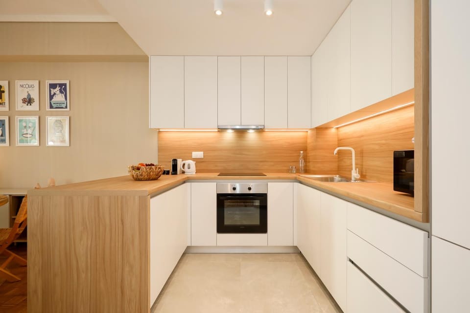 Kitchen or kitchenette, dishwasher, oven, stove, toaster